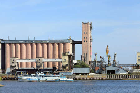 Grain Elevator on the bank of the Volga river. Architecture of Soviet Union. City of Kazan, Republic...