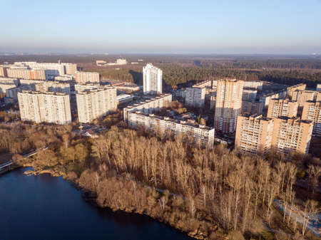 BALASHIKHA, RUSSIA - OCTOBER 31, 2021. Aerial view of the residential neighborhood and public park on the banks of Pekhorka river on a sunny autumn day. City of Balashikha, Moscow oblast, Russia.のeditorial素材