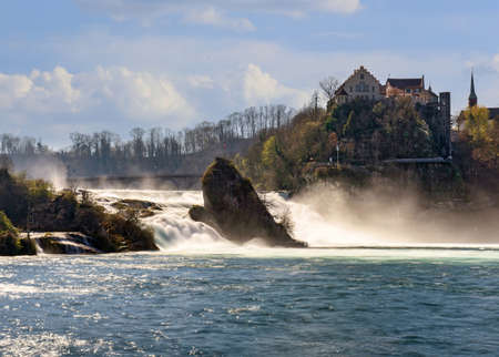Rhine Falls - most powerful waterfall in Europe located on the Rhine river on the border between the cantons of Schaffhausen and Zuerich. View of the medieval Laufen Castle. Switzerland, Europe.のeditorial素材