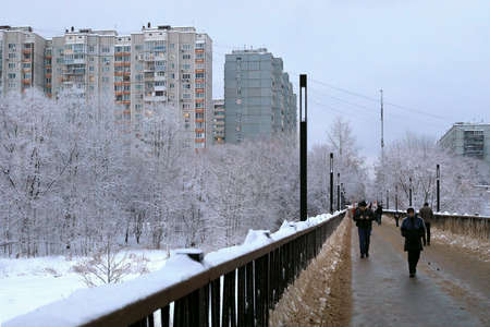 BALASHIKHA, RUSSIA - DECEMBER 15, 2021. View of the residential neighborhood in winter. Bridge over the Pekhorka river. City of Balashikha, Moscow region, Russia.のeditorial素材