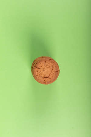 Biscuits on table with green backgroundの写真素材