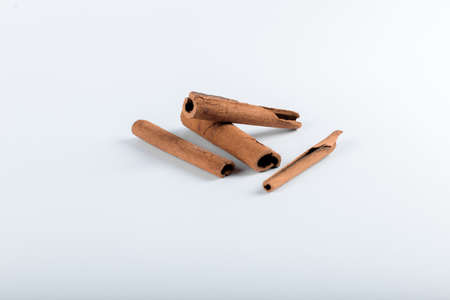 Cinnamon sticks on a white background
