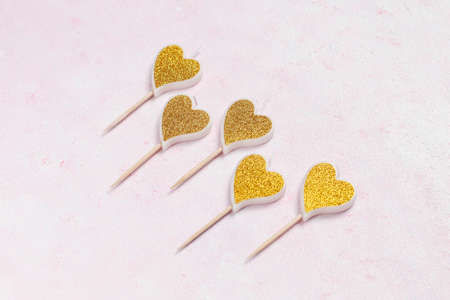 Valentines day background, heart shaped candles,top view