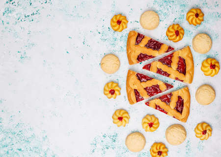 Various cookies,biscuits and sweets on light background,top view