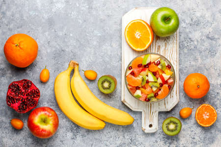 Fresh fruit salad in the bowl with fresh fruits.の写真素材