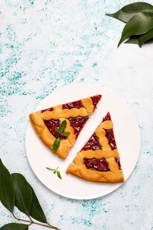 Delicious traditional berry cherry pie Crostata on light background