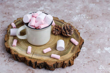 Two cup of hot chocolate with marshmallow on light backgroundの写真素材