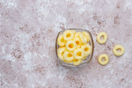 Salty snacks. Pretzels, chips, crackers,popcorn in bowls. Unhealthy products. food bad for figure,...
