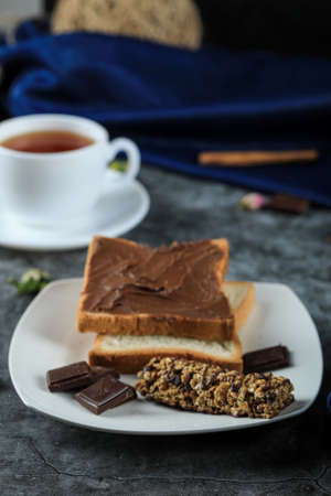 Chocolate toast with a cup of teaの写真素材