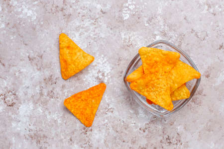 Salty snacks. Pretzels, chips, crackers,popcorn in bowls. Unhealthy products. food bad for figure,...