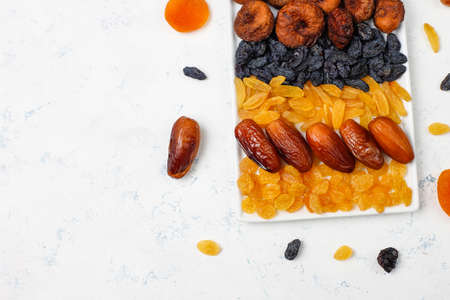 Various dried fruits,dates,plums,raisins,figs,top viewの写真素材
