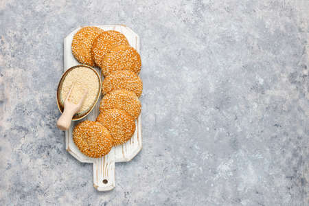 Cookies with sesame seeds on concrete background,top viewの写真素材