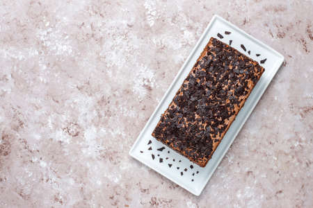 Tasty homemade chocolate truffle cake with coffee on light backgroundの写真素材