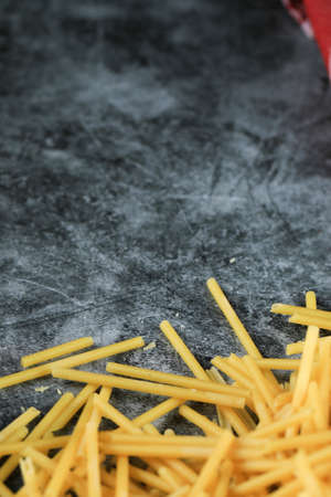 Homemade fresh spaghetti on the bottom side of the backgroundの写真素材