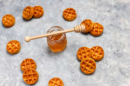 Homemade Mini waffles on grey concrete background