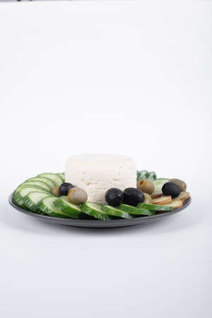 Cucumber, olives and white cheeseの写真素材
