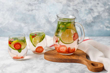 Fresh lime,strawberry and mint infused water, cocktail, detox drink, lemonade. Summer drinks. Health care concept.の写真素材