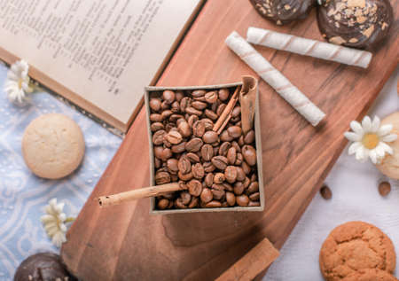 Coffee beans box with chocolate biscuits. top viewの写真素材