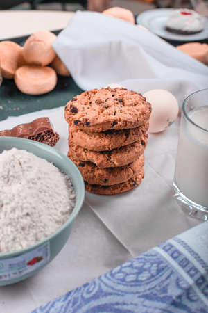 Oatmeal cookies and a bowl of flour