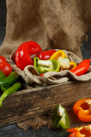 Colorful vegetables in a rustic tray.