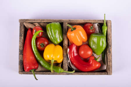 Color peppers tray in white. Top view.の写真素材
