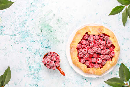 Open pie, raspberry galette. Summer berry dessert.の写真素材