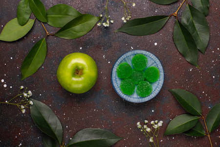 Apple green marmalade candy in sugar. Healthy dessert for gourmets.の写真素材