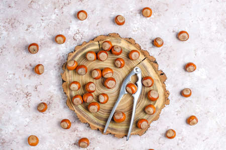 Hazelnuts on concrete background,top viewの写真素材