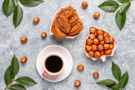 Delicious sweet chocolate cake roll with hazelnut cream and hazelnuts,top viewの写真素材