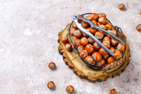 Hazelnuts on concrete background,top view