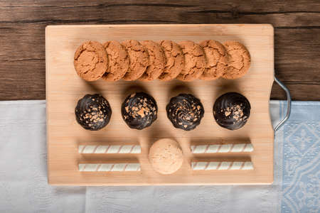 Top view of mixed cookie with oatmeal and chocolate