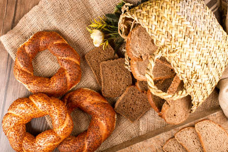 Slices of dark and white bread with tasty turkish bagels