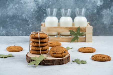 Chocolate cookies in rope on a wooden board
