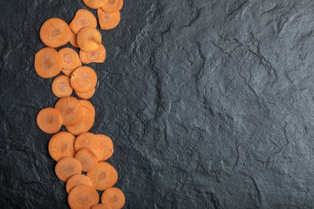 Organic fresh raw carrot slicesの写真素材