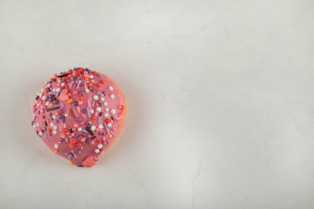 Colorful sweet small doughnut with sprinklesの写真素材