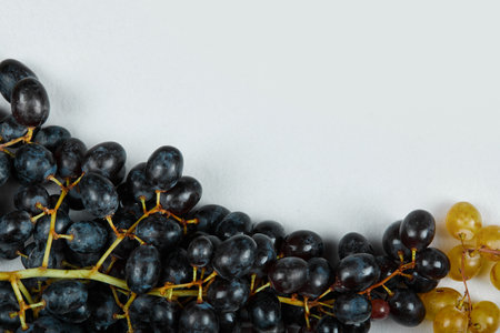 A bunch of red grapes on white backgroundの写真素材