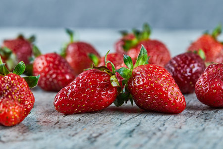 Fresh red strawberries on marble background