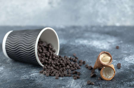 Cup of sweet small chocolate with candy