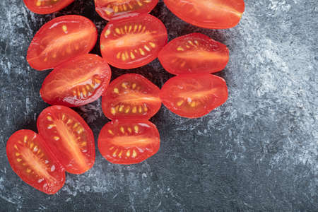 Top view. Half cut fresh cherry tomatoes