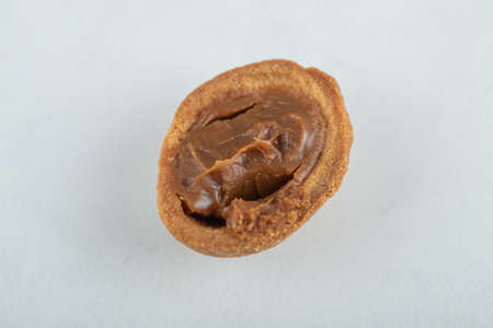 Walnut sweet cookie on a white backgroundの写真素材
