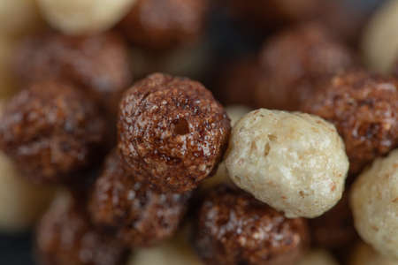 Chocolate corn balls flakes as a backgroundの写真素材