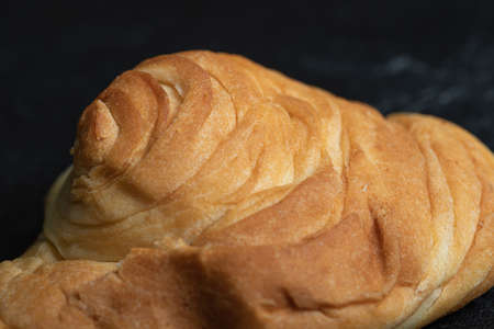 Delicious fresh pastry on a dark background