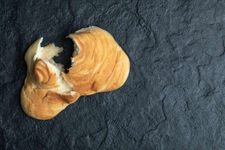 Delicious fresh pastry on a dark backgroundの写真素材