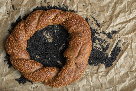 Turkish crunchy round braided bagel with sesame seeds