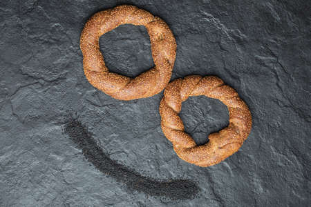 Turkish crunchy round braided bagels with sesame seedsの写真素材