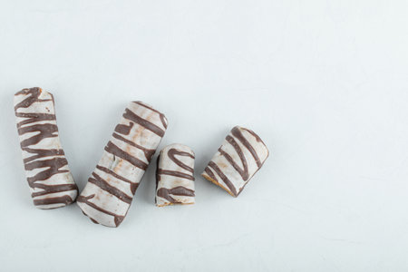 Delicious chocolate bars on a white background