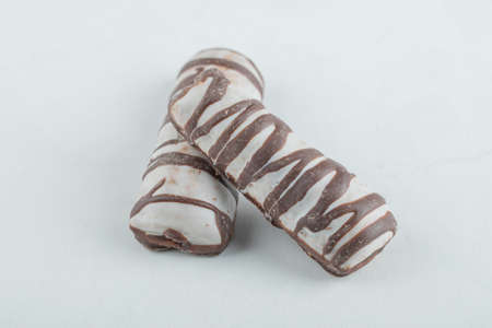 Delicious chocolate bars on a white background
