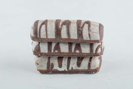 Delicious chocolate bars on a white backgroundの写真素材
