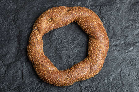 Turkish crunchy round braided bagel with sesame seedsの写真素材