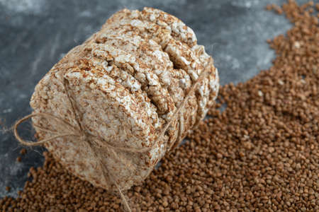 Stack of rice cake tied with rope on marble background